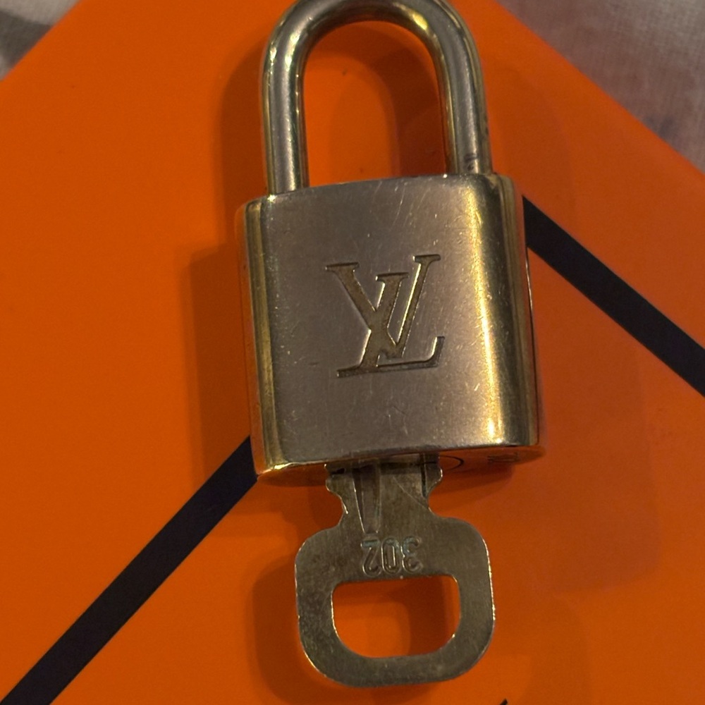 #302 Louis Vuitton Lock & Key